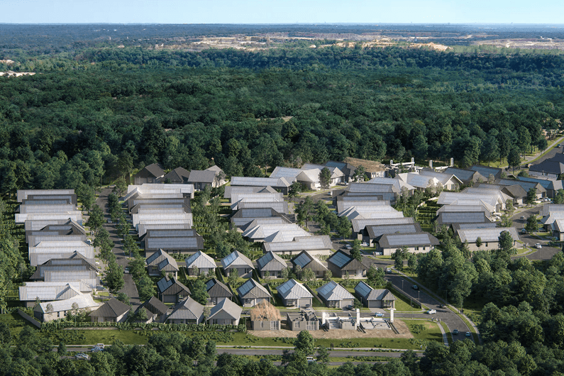 Foto aérea mostrando várias casas e o céu ao fundo para ilustrar que bairro está sendo criado com 100 casas impressas em 3D. Foto: Icon/Reprodução.