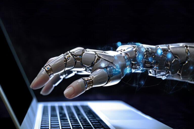 Imagem de um braço humanoide estendido sobre o teclado de um notebook ilustra o post cujo título pergunta: A OpenAI removeu a palavra 'segurança' de sua missão — e por que isso preocupa?