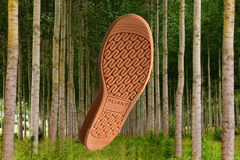 Imagem em foreground de um solado de tênis feito de fibras naturais e no background umas árvores para ilustrar o post cujo título diz que um aporte de investidores salvou startup um dia antes de ela falir.